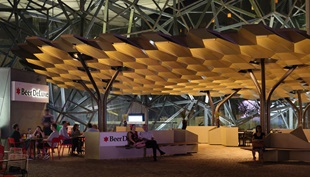 The canopy contributes to the overall quality of Fed Square by creating a new place for people to gather and connect. 